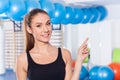Beautiful happy young woman in gym. Gym shot. Crossfit hall. She Royalty Free Stock Photo