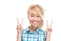 Beautiful happy young woman victory gesture. Royalty Free Stock Photo