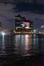 Beautiful harbour of Hamburg with Elbphilharmonie concert hall by night - HAMBURG, GERMANY - DECEMBER 25, 2020 Royalty Free Stock Photo