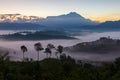 Beautiful harmony romantic color sunrise landscape scenery with sunlight and fog and Mount Kinabalu Royalty Free Stock Photo