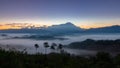 Beautiful harmony romantic color sunrise landscape scenery with sunlight and fog and Mount Kinabalu Royalty Free Stock Photo