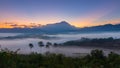 Beautiful harmony romantic color sunrise landscape scenery with sunlight and fog and Mount Kinabalu Royalty Free Stock Photo