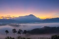 Beautiful harmony romantic color sunrise landscape scenery with sunlight and fog and Mount Kinabalu Royalty Free Stock Photo