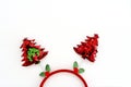 Beautiful headband funny christmas trees isolate on a white backdrop. concept of joyful Christmas party,New year is coming soon,