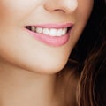 Beautiful healthy female smile with perfect natural white teeth, beauty face closeup of smiling young woman, bright Royalty Free Stock Photo