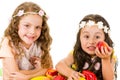 Beautiful healthy little girls holding delicious Royalty Free Stock Photo