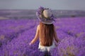 Beautiful healthy long hair. Back view of Young teen girl in hat