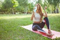 Gorgeous athletic woman doing yoga at the park Royalty Free Stock Photo