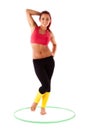 Beautiful healthy woman performs exercises with hula hoops Royalty Free Stock Photo