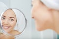 Beautiful healthy woman and reflection in the mirror Royalty Free Stock Photo