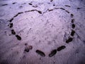 A beautiful heart full of love anchored on the sand Royalty Free Stock Photo