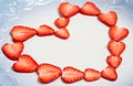 Beautiful heart symbol from chopped red juicy strawberry Royalty Free Stock Photo