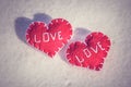 Beautiful hearts on a snow backgroud