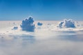 Beautiful Heavenly Bursts of Clouds in Blue Sunny Sky like Atom Bomb Explosion Royalty Free Stock Photo