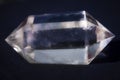 A herkimer diamond, quartz crystal with points on both ends.