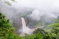 Beautiful hidden Ekom Waterfall deep in the tropical rain forest of Cameroon, Africa