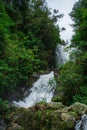 Beautiful hidden waterfall in a forest. Adventure and travel concept. Nature background. Kaiate Falls, Bay of Plenty