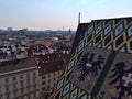 Beautiful high angle view over the historic downtown of Vienna, Austria with the famous tile roof of Stephansdom cathedral.