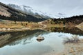 Beautiful high mountains of the Canadian Rockies reflecting in an alpine lake along the Icefields Parkway between Banff and Jasper Royalty Free Stock Photo