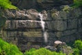 Beautiful high waterfall in the mountains Royalty Free Stock Photo