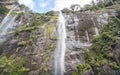 Beautiful high waterfalls in Milford Sound national park in south island of New Zealand. Milford Sound is known as the land of a t Royalty Free Stock Photo