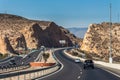 A highway among the yellow mountains is near Almeria in Spain