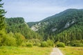 A beautiful hiking trail in Low Tatra region in Slovakia. Walking path in mountains and forest. Royalty Free Stock Photo