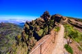 Beautiful hiking trail from Pico do Arieiro to Pico Ruivo, Madeira island. Footpath PR1 - Vereda do Areeiro. On sunny summer day Royalty Free Stock Photo