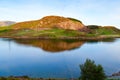 Beautiful hill reflected in a lake