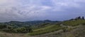 Beautiful hills with vineyards in Tuscany with town San Gimignano in Italy Royalty Free Stock Photo