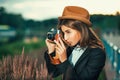 Beautiful hipster girl shooting