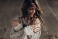 Beautiful hipster woman in boho indie clothes, posing in winter Royalty Free Stock Photo