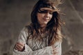 Beautiful hipster woman in boho indie clothes, posing in winter Royalty Free Stock Photo