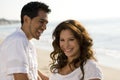 Beautiful Hispanic couple laughing and smiling.