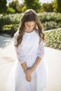 Beautiful hispanic little girl in a formal dress