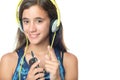 Beautiful hispanic teenager listening to music Royalty Free Stock Photo