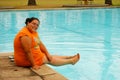 Beautiful Hispanic Woman by the pool