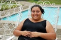 Beautiful Hispanic Woman by the pool