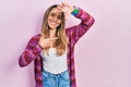 Beautiful hispanic woman wearing colored jacket smiling making frame with hands and fingers with happy face Royalty Free Stock Photo