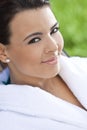 Beautiful Hispanic Woman in White Bathrobe At Spa