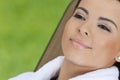 Beautiful Hispanic Woman in White Bathrobe At Spa