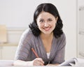 Beautiful Hispanic Woman Writing Royalty Free Stock Photo