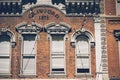 Beautiful historic building with old large windows, outdoor lights in a historic place of Denver city Royalty Free Stock Photo