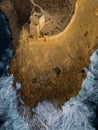 Xlendi Tower with rough waves aerial top down view at golden hour Gozo Malta Royalty Free Stock Photo