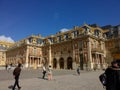 Beautiful historical buildings and tourists in the Chateaux de Versailles in paris in France Royalty Free Stock Photo