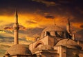 Beautiful historical Sultan Selim Camii in front of dramatic sunset in Konya