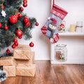 Beautiful holdiay decorated room with Christmas tree and presents under it. New Year decorations Royalty Free Stock Photo