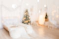 Beautiful holiday decorated room with Christmas tree and bright lights , out of focus shot for photo background. Blur christmas Royalty Free Stock Photo