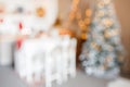 Beautiful holiday decorated room with Christmas tree and bright lights , out of focus shot for photo background. Blur christmas Royalty Free Stock Photo