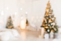 Beautiful holiday decorated room with Christmas tree and bright lights , out of focus shot for photo background. Blur christmas Royalty Free Stock Photo